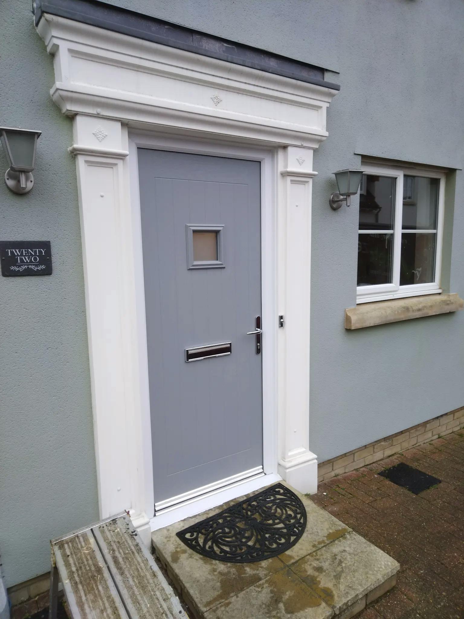 Balancing modern and classic with a pastel door installation recent work card